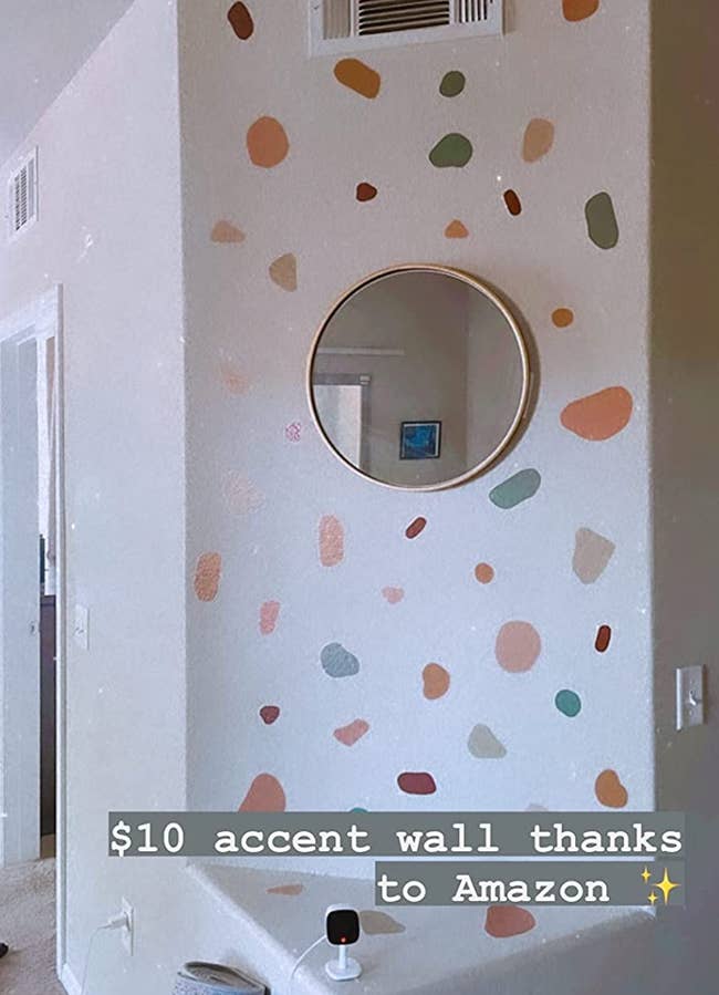reviewer photo of the decals on their wall in their apartment