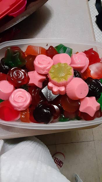 A container filled with different shaped jellies