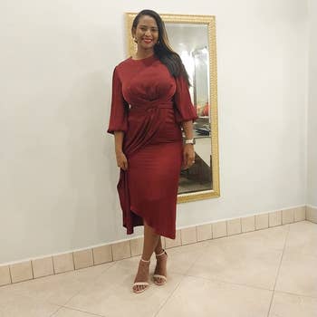 different reviewer in red midi dress