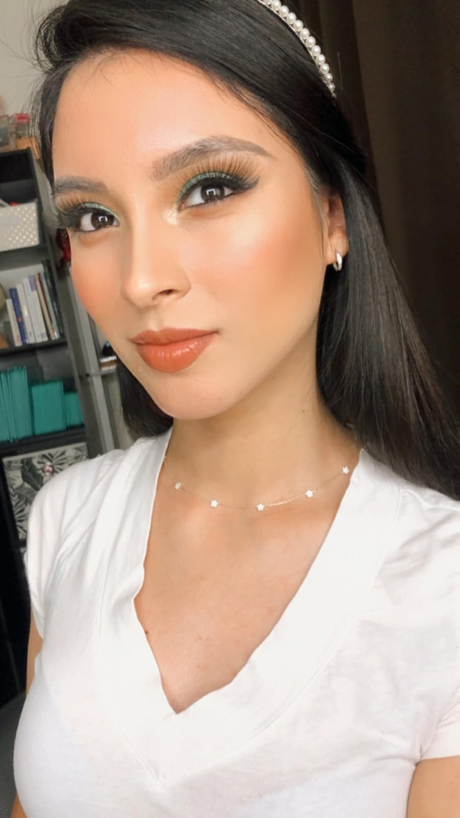 reviewer with smooth looking makeup