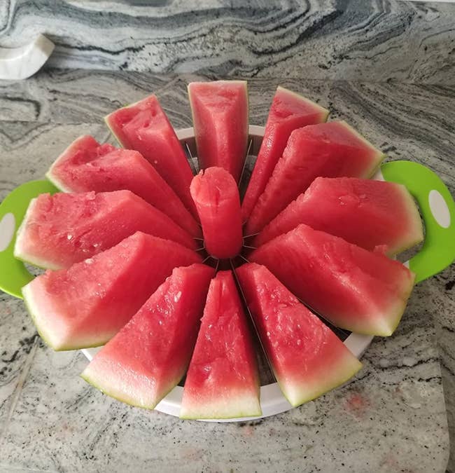 reviewer's sliced watermelon arranged in a circular pattern after being cut 