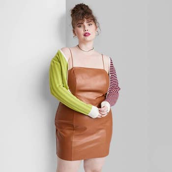 model in brown mini dress