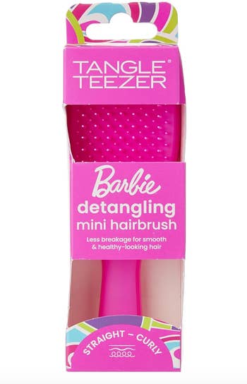 Pink barbie hairbrush in its packaging 