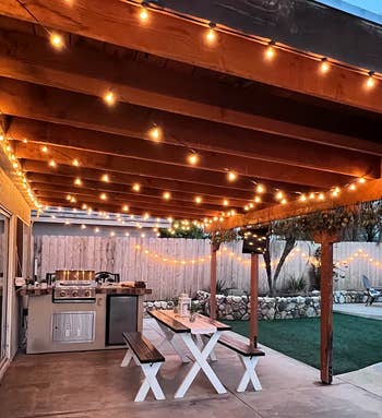 same reviewer showing another set of lights in the covered area of their patio