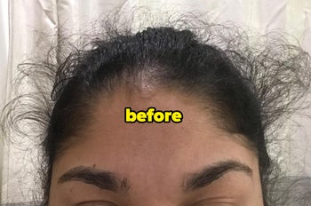 Reviewer with frizzy hair and lots of flyaways before using the stick