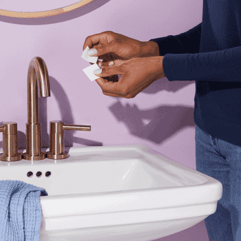 GIF of model using hand soap sheets