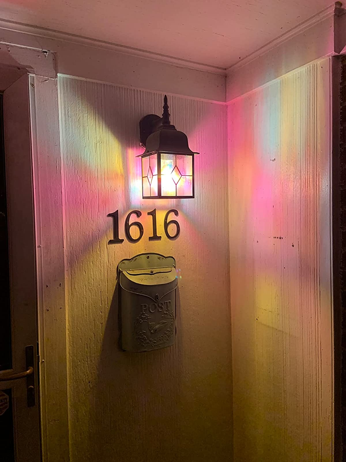 reviewer image of the lightbulb in a sconce on a porch