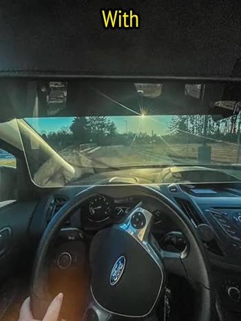 Car interior showing a wide   presumption    done  a windshield with a glare-reducing visor. Text astatine  apical  reads 
