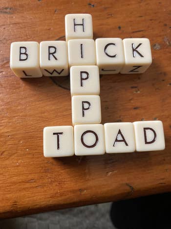Scrabble tiles connected  a array  signifier  the words 