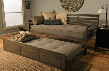 lifestyle photo of mattresses on trundle bed, detached from main bed
