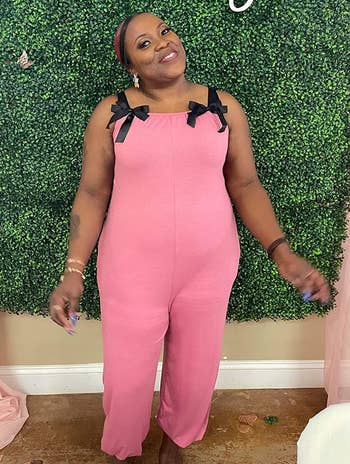 reviewer wearing the pink jumpsuit