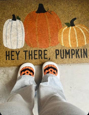 Person successful cozy pants and pumpkin slippers lasting connected doormat with 3 pumpkins and substance