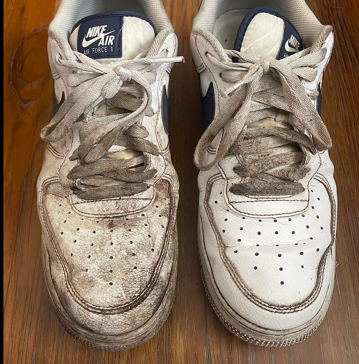 A pair of sneakers with one dirty and one cleaned with the sneakeraser 