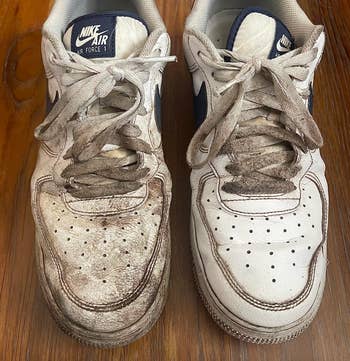 A pair of sneakers with one dirty and one cleaned with the sneakeraser 