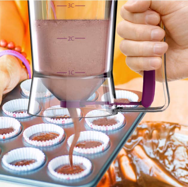A dispenser that's allocating batter to a cupcake tin