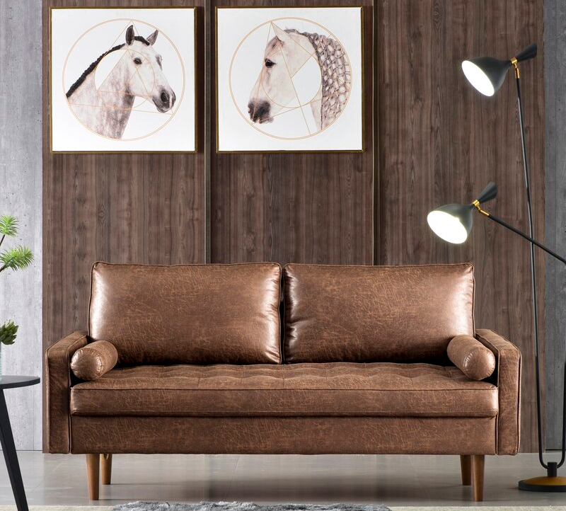the faux brown leather couch in a deeper wash