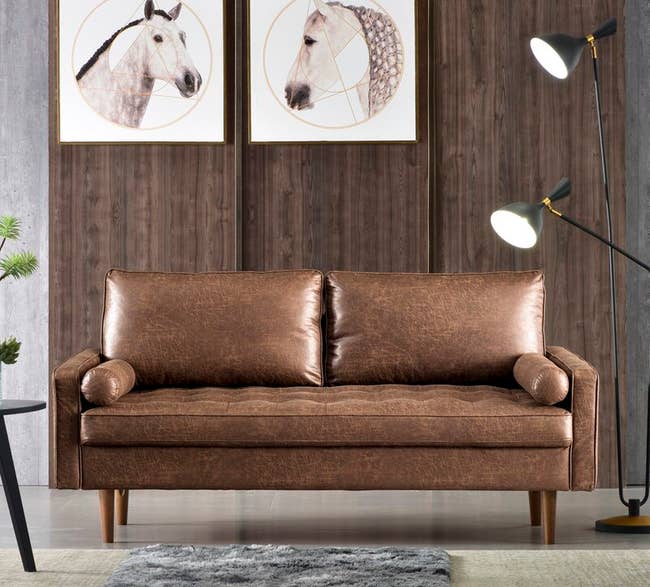 the faux brown leather couch in a deeper wash