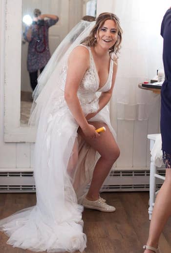 Reviewer successful wedding formal applying Gold Bond Friction Defense to their interior thighs