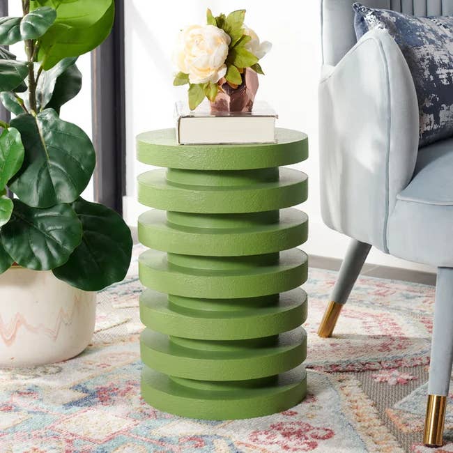side table that looks like a stack of discs 