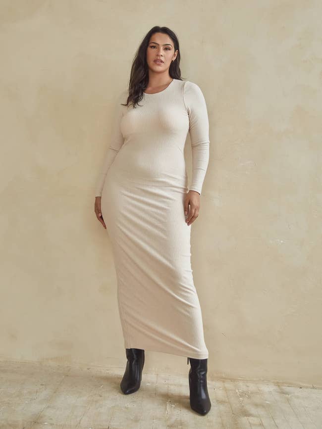 model in bodycon ankle length sweater dress