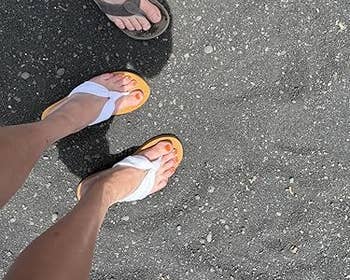 Two radical wearing flip-flops basal connected a textured surface, showing a casual footwear benignant suitable for summertime buying oregon formation outings