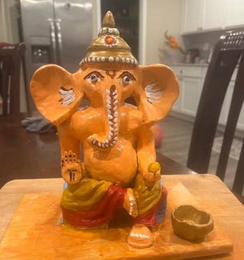 Handcrafted and painted Ganesha statue made of aerial adust clay