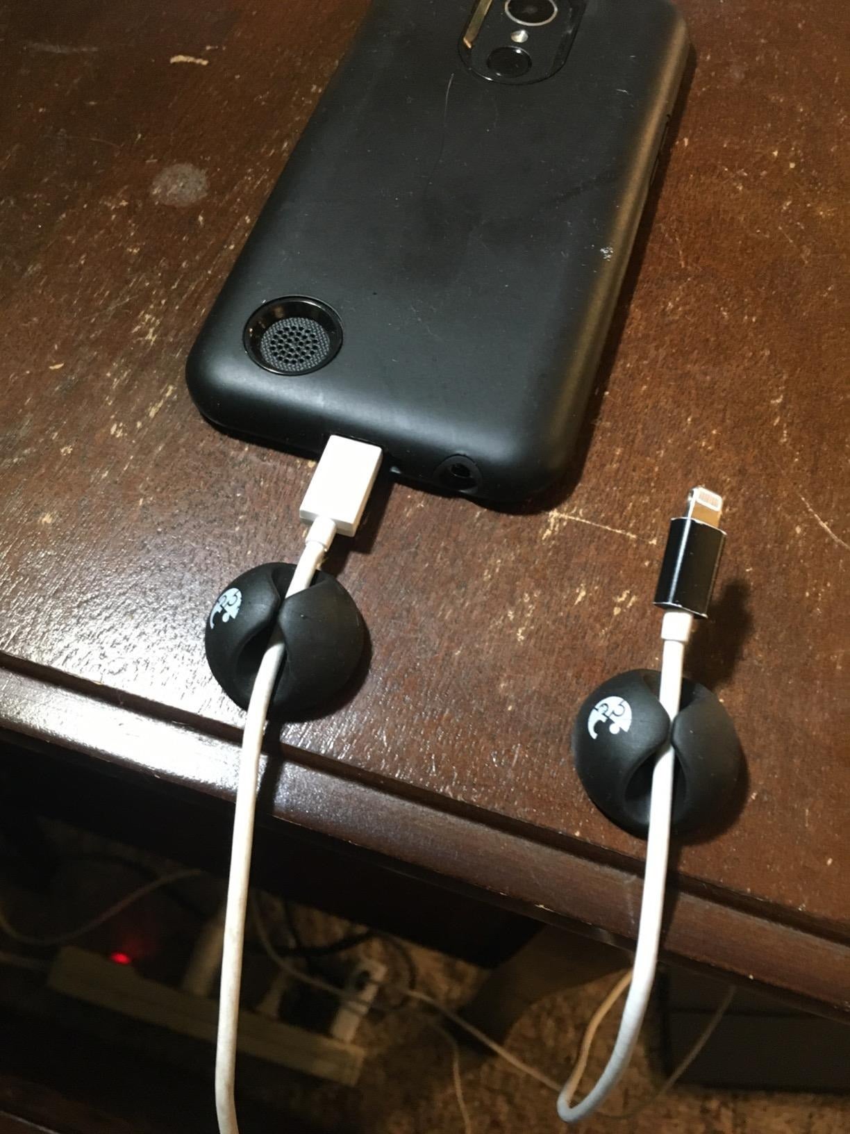 reviewer image of two cords organized using the cable clips
