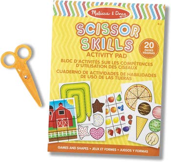 A pair of yellow scissors and an activity pad
