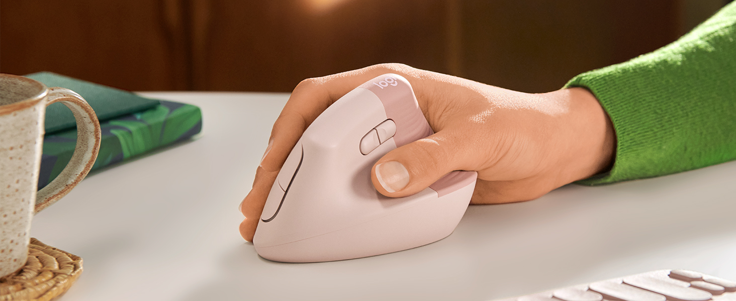 hand on the pink vertical mouse