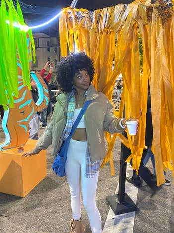 reviewer wearing the jacket in khaki