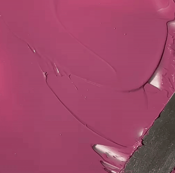 A spatula blending the mauve blush shade