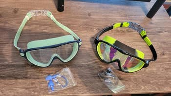 a reviewer's two pairs of goggles on a table