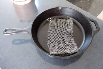 reviewer image of the stainless steel cast iron cleaner in a clean cast iron pot