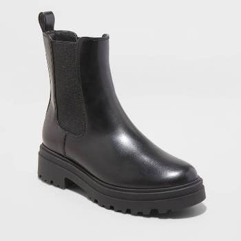 a black high-top chelsea rain boot