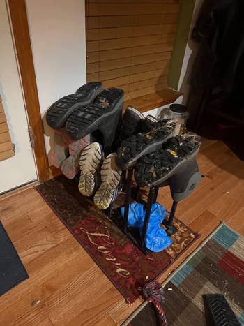 reviewer photo of boots on boot rack by the doorway
