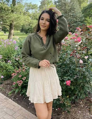 model in olive green version with a skirt