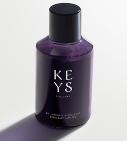 the purple exfoliator bottle