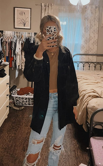 reviewer mirror selfie wearing the corduroy shacket in black