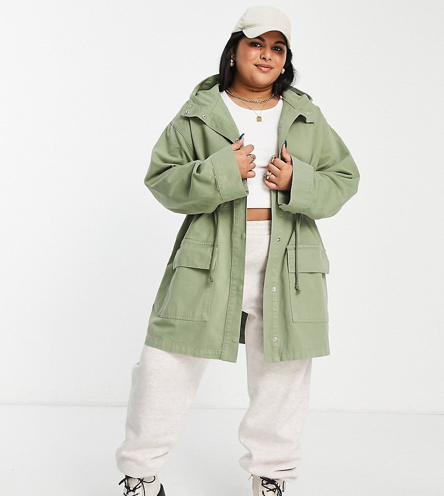 model wearing sage green fall coat