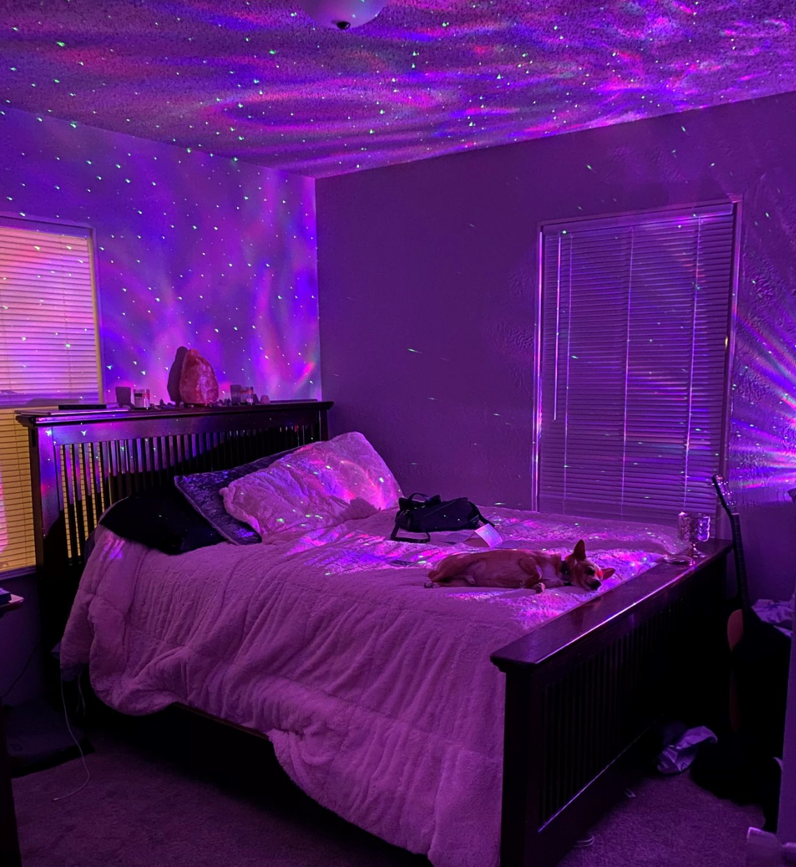 reviewers bedroom lit up by the galaxy light