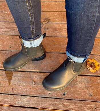 reviewer wearing the black Blundstone boots