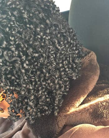 a reviewer with their coily hairsbreadth looking shiny and well-defined