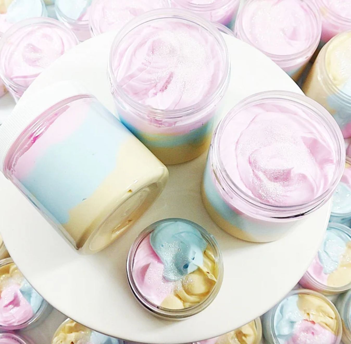 various jars of the unicorn body butter