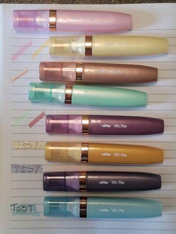Eight pastel highlighters connected  lined insubstantial  with tested colour  swatches beside each   one