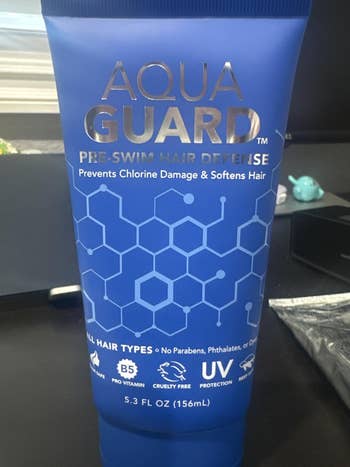 Aqua Guard Pre-Swim Hair Defense conduit  connected  desk; prevents chlorine harm  and softens hair, suitable for each  hairsbreadth  types, cruelty-free, UV protection