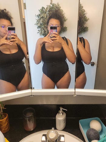 reviewer wearing the swim suit