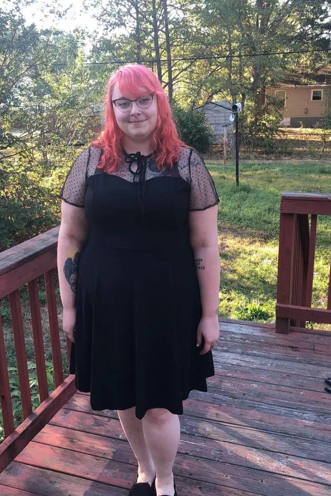 A reviewer wearing the dress in blackA reviewer wearing the dress in black