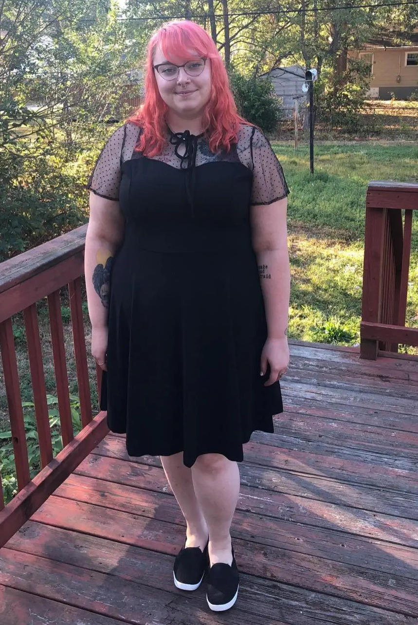 A reviewer wearing the dress in blackA reviewer wearing the dress in black