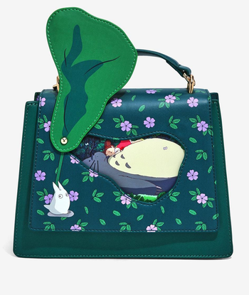 bag with leaf panel raised to reveal sleeping totoro image from the movie