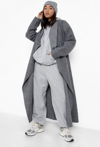 model wearing long open waterfall coat in grey